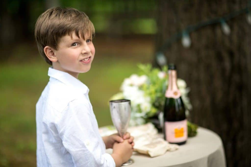 Heather + Nathan, Family Vow Renewal with Kissing on the Lips 18 Benny veuve Alisa Tongg Celebrant Family Vow Renewal at The Living Wall at Promise Ridge Jeremie Barlow Photography