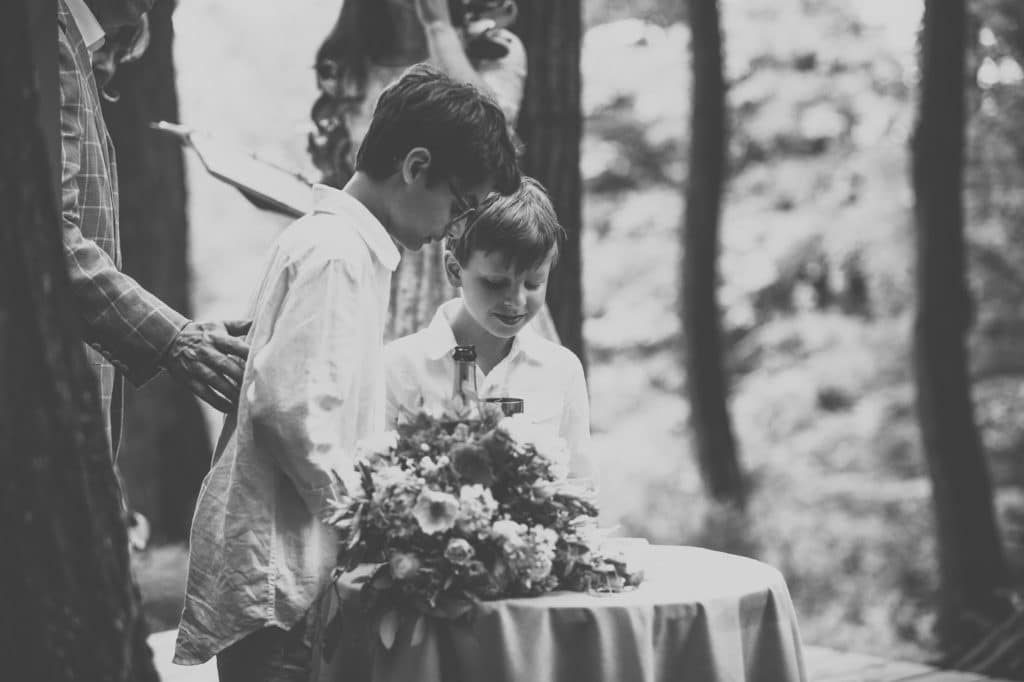 Heather + Nathan, Family Vow Renewal with Kissing on the Lips 23 Family Shared cup ritual Alisa Tongg Celebrant Family Vow Renewal at The Living Wall at Promise Ridge Jeremie Barlow Photography
