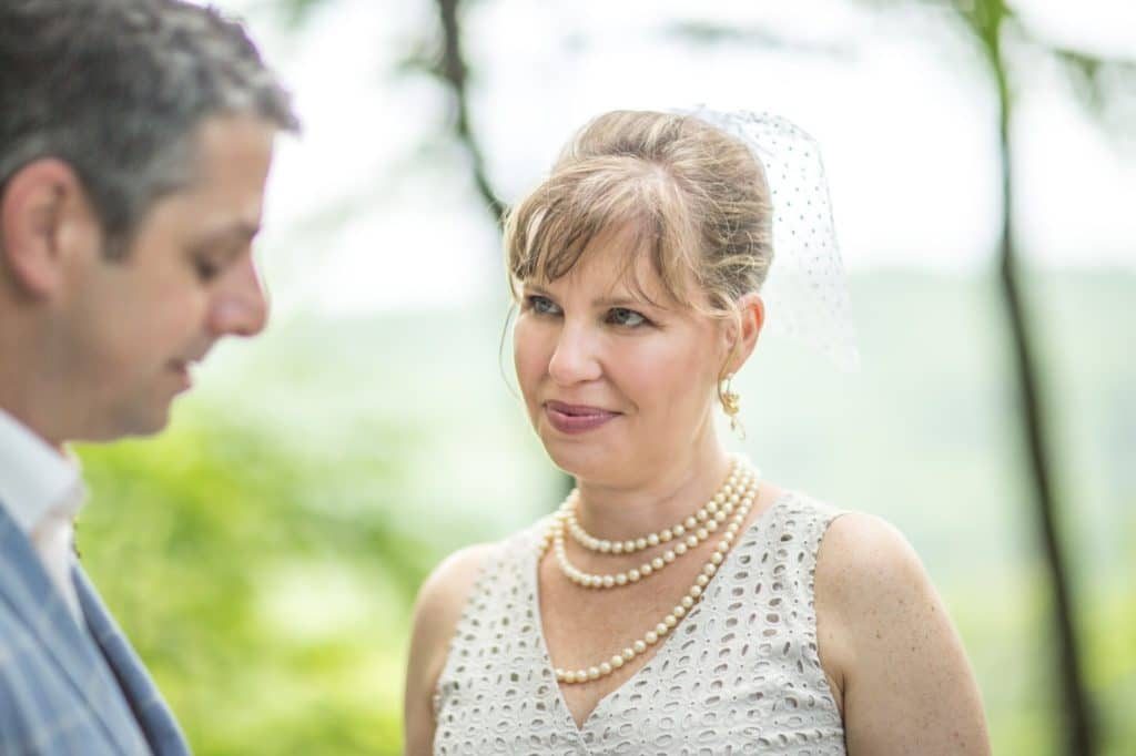 Heather + Nathan, Family Vow Renewal with Kissing on the Lips 25 Nate vows Alisa Tongg Celebrant Family Vow Renewal at The Living Wall at Promise Ridge Jeremie Barlow Photography