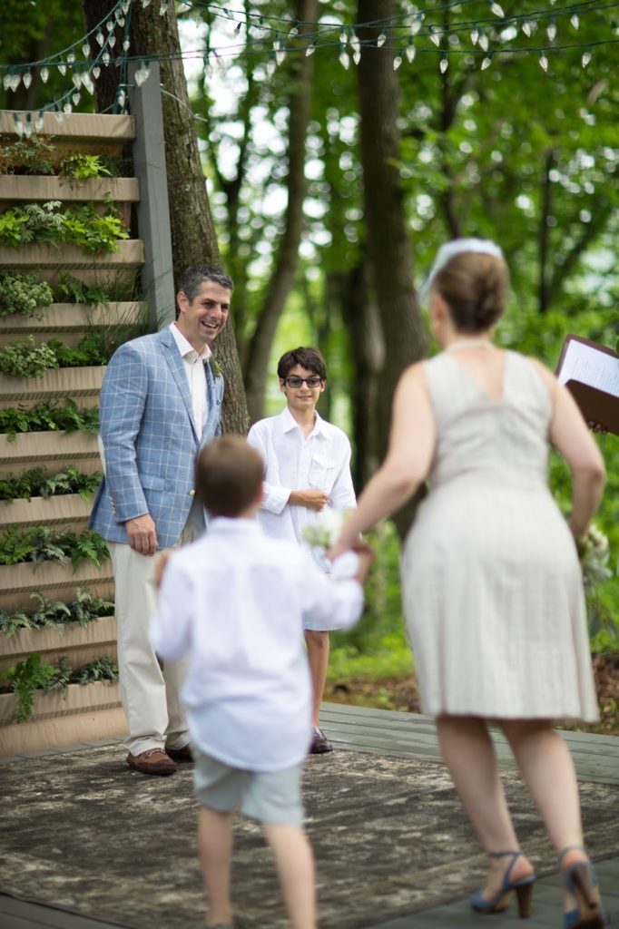 Heather + Nathan, Family Vow Renewal with Kissing on the Lips 14 Processional II Alisa Tongg Celebrant Family Vow Renewal at The Living Wall at Promise Ridge Jeremie Barlow Photography